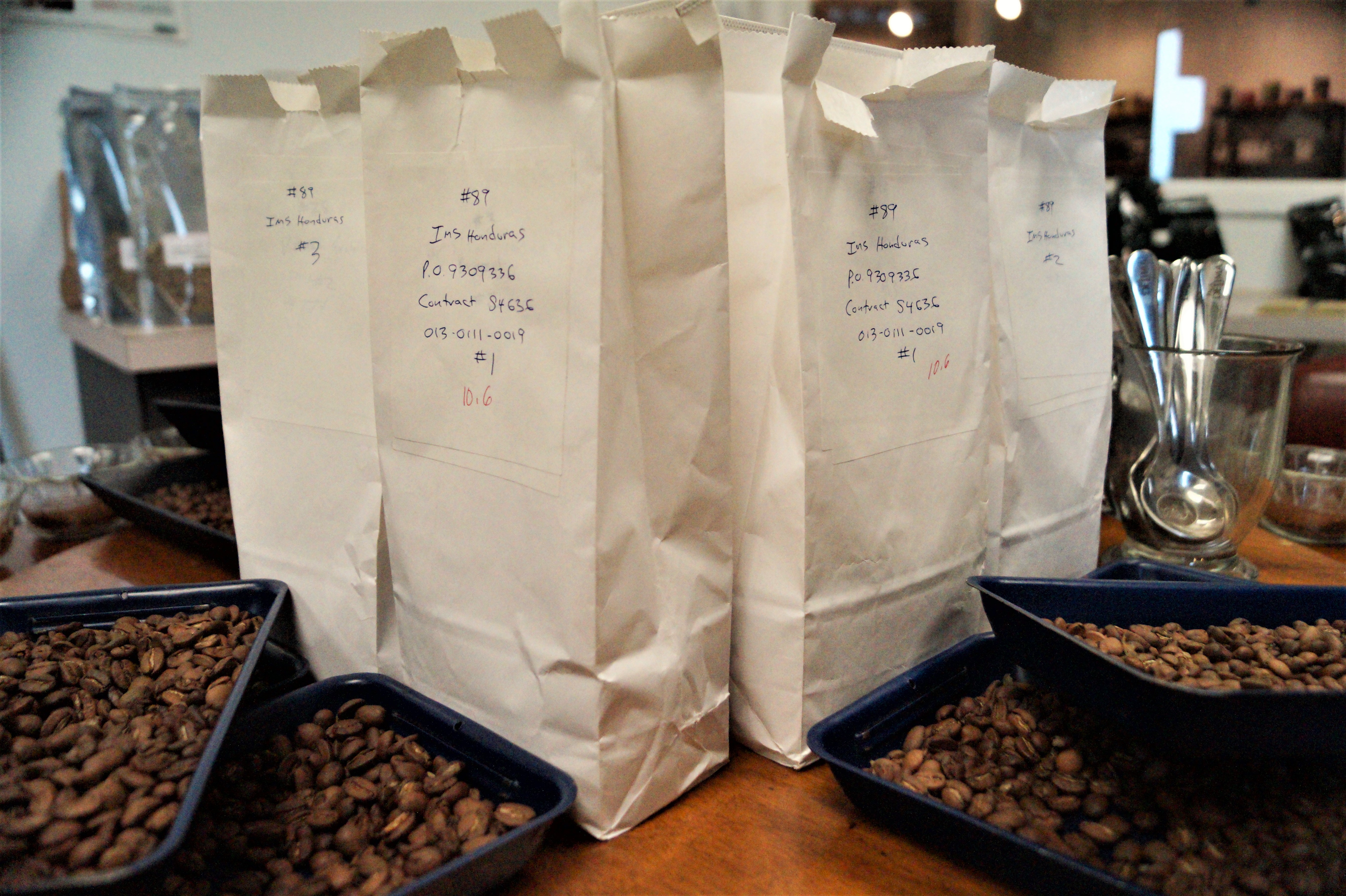 Coffee bean samples sent to Paul deLima for quality assurance testing and awaiting the cupping process.